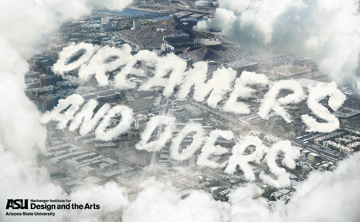 Wallpaper with 'Dreamers and Doers' written in the clouds
